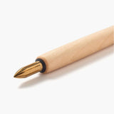 The petite nib holder is compact yet thoughtfully designed with optimal thickness, length and balance for writing. We created it to inspire all ages to discover the joy of writing with dip pens.

Each nib holder is crafted from Japanese maple wood and finished with a plant-based oil that meets the highest international safety standards. Applied by the skilled hands of craftspeople, the finish evolves with time and use, enhancing the natural texture and grain of the maple for lasting writing pleasure.

Use a