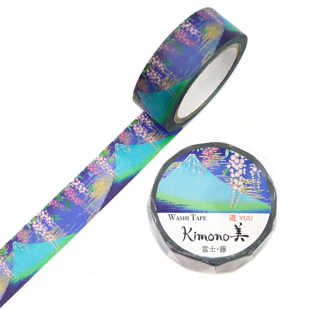 Experience the quiet romance of Japanese spring with this exquisite Kimono Beauty Mt. Fuji Wisteria Washi Tape from Kamiiso. The design pairs the iconic silhouette of Mount Fuji with cascading wisteria blossoms, a flower long admired in Japan for its elegance, sweetness, and poetic symbolism.