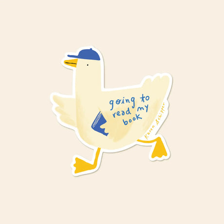 If you stock book stickers, this one practically sells itself. Duck Reader Sticker brings instant charm to your display with a cozy little duck clutching its favorite read — a cute book sticker readers can’t help but smile at.

Made from matte-coated, waterproof vinyl, it’s durable enough for laptops, planners, water bottles, and more. It’s an easy impulse add-on for cat people, best friends, and shoppers looking for a small but meaningful gift.

Measures approximately 3 inches
Matte coating; durable, water