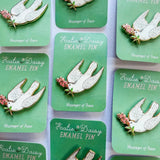 A tiny treasure to pin on your jacket, tote, or favorite old flannel—each one a little love letter to country delights, small joys, and the art of noticing.

Details:
• 1.75” on the longest side
• Gold-plated finish
• Rich, detailed UV printing
• Double pin posts with sturdy metal backings
• Mounted on a backing card


Designed with love in my Oregon studio. Manufactured in China.
Collect them all or gift one to a kindred spirit. 🌸
