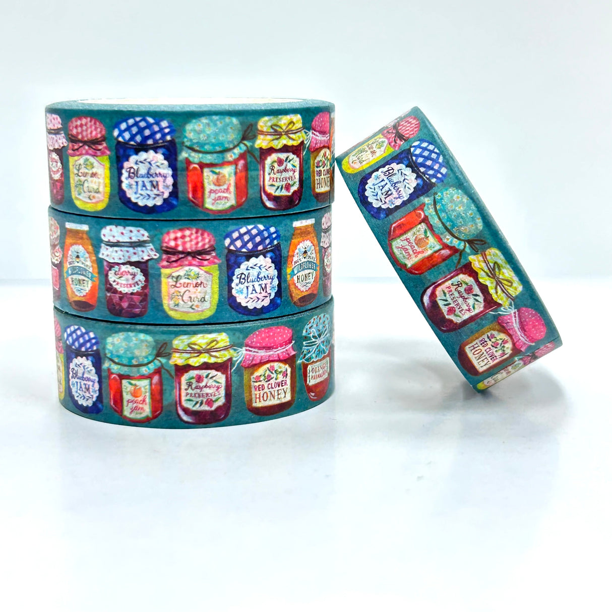 Katie Daisy Washi Tape - Jar of Jam

There are so many uses for washi tape! You can use it for scrapbooking, gift wrapping, and even home decor projects :) Add some extra charm to your letter-writing, use it to tack up photos... the possibilities are endless!

Include 1 roll of washi
Traditional washi tape, printed on rice paper
Each roll is 15mm wide, 10m long, and the pattern reprints every 350mm.
Semi-transparent&nbsp;