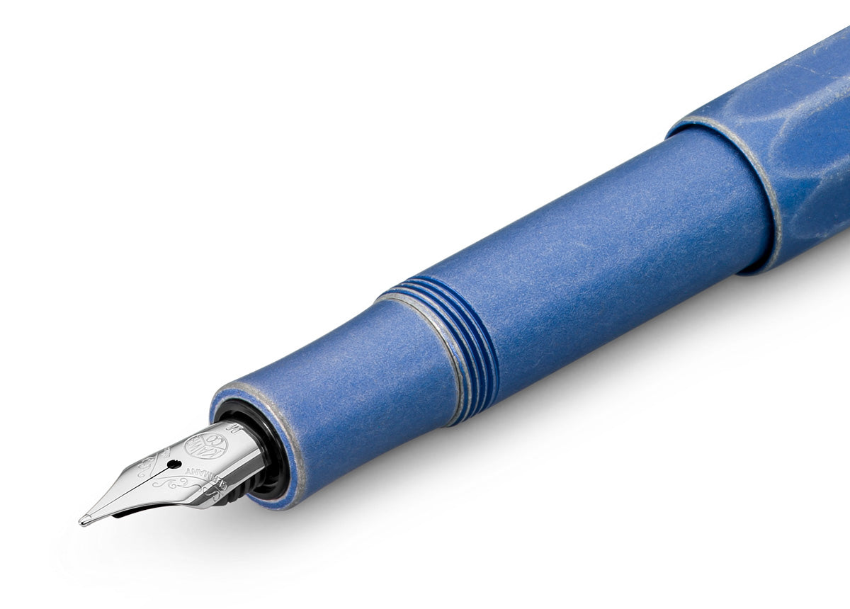 Kaweco AL SPORT Fountain Pen Stonewashed Blue

The AL Sport fountain pen in Stonewashed Blue not only has a casual look but also fits snugly in your hand.

The metallic body is made of high-quality aluminium and grants an unique haptic experience. Its fine surface imparts elegance.