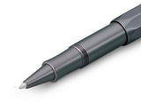 Contemporary design made of high-quality aluminium for an incomparable writing feel.

Our AL Sport roller ball anthracite is a pen to behold. The silky, glossy surface in a warm grey tone has an expressive and noble appeal. It is a perfect accessory for everyday use in the office, daily life, and leisure.

The metallic body is made of high-quality aluminium and grants an unique haptic experience. Its fine surface imparts elegance.

The Kaweco Sport was created in 1911. The pocket-sized roller ball pen only 
