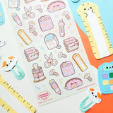 @catsoul_draws has put together the sweetest set of supplies, where even the stationery comes with whiskers and toe beans! From paw-print box cutters and cat-shaped rulers to notebooks, scissors, calculators, and washi tape, these kawaii supplies are here to make any workday a little more pawsitive.

Art by: @catsoul_draws


One sticker sheet is included.
Top Coating: None
Adhesive Layer: Paper
Backing Layer: Clear PET 
Size: 6.69"x3.54"
Weight-0.03oz