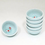 Koi Fish Kung Fu Tea Cups 6 Piece Set - Sky Blue

Size: 2.5"D x 1"H 
Material: Porcelain&nbsp;
Origin: China