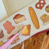 5 meters of pure kiss-cut, washi sticker bakery bliss~

They readjust easily and blend in with the paper. (Lighter paper recommended for maximum visibility)

Just like the washi tape material you love, but in a sticker roll. No more saving your stickers for later! Use it up!!

Dimensions: 50mm x 5m