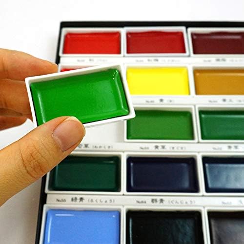 Take your artistic expression to the next level with the Zig Kuretake Gansai Tambi 18-Piece Watercolor Set.&nbsp;

These high-quality Japanese traditional solid watercolors offer stunning finishes, ideal for artists and crafters with a keen eye for detail. Their water-based pigments blend beautifully and create luminous effects, making them perfect for sketching, illustrating, and adding refined touches to mixed media projects.

This set contains White, Black, Cadmium Scarlet, Red, Rose Madder, Rose Madder 
