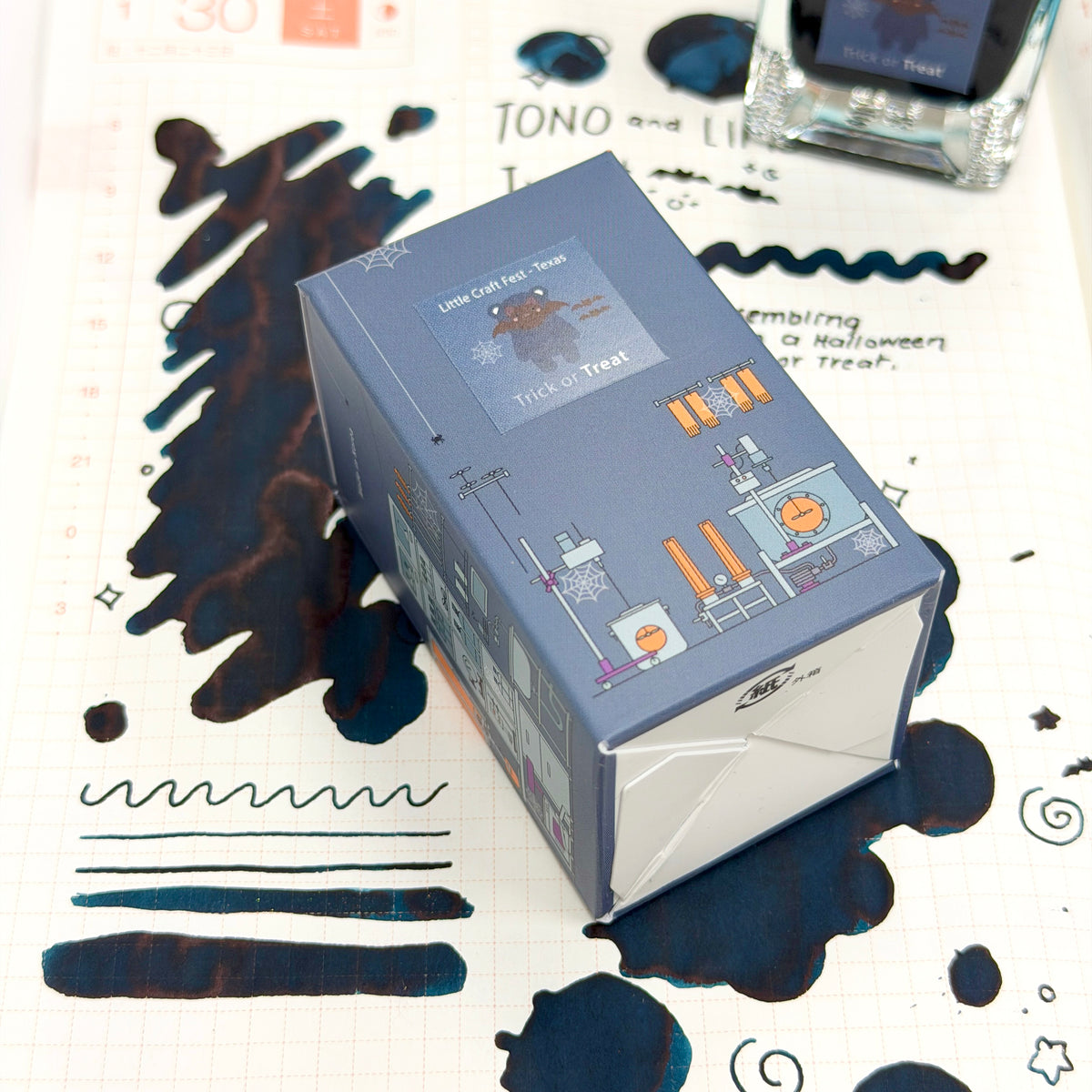 Treat is a playful blue-grey that proves the sweetest rewards are often unexpected. A cool stormy slate base is illuminated by bright cerulean highlights and warm rosy undertones that appear where the ink pools and shades. The result is a wonderfully dynamic color that shifts between soft and striking, capturing the excitement of a Halloween haul filled with favorite finds. Charming, versatile, and full of character, Treat brings a touch of delight to every page.
