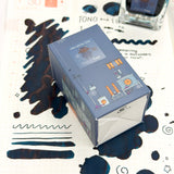 Treat is a playful blue-grey that proves the sweetest rewards are often unexpected. A cool stormy slate base is illuminated by bright cerulean highlights and warm rosy undertones that appear where the ink pools and shades. The result is a wonderfully dynamic color that shifts between soft and striking, capturing the excitement of a Halloween haul filled with favorite finds. Charming, versatile, and full of character, Treat brings a touch of delight to every page.
