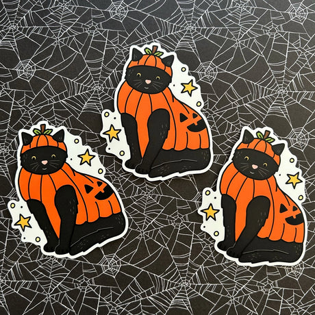 Little Spooky Studio - Beanie Pumpkin Cat Vinyl Sticker

A black cat wearing a pumpkin costume :)