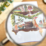 Postcard featuring my original watercolor and ink illustration of the magical foxes and delightfully whimsical holiday items arranged on the shelves of a Christmas witch, including a tiny mouse reading a book, beautifully wrapped presents, and portraits of the witch's friends.

• Printed on high quality card stock
• Each postcard measures 4.25 x 5.5" (A2)