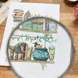Postcard featuring my original watercolor and ink illustration of the oddities, books, tools, and trinkets tucked away in the shelves of a sea witch, including a sea otter relaxing in a cauldron with a good book.

• Printed on high quality card stock
• Each postcard measures 4.25 x 5.5" (A2)