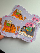 A Kitten and Puppy Bus sticker!

This vinyl matte sticker is weather and waterproof-stick it on a notebook, bike, or car- it's going to stick around! Heck, throw it on a water bottle and through the dishwasher. This sticker can go anywhere. Sticker measures 3" x 5" Printed in USA.