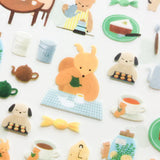 This cute sticker designed by illustrator Mariko Fukuoka looks like a delicious aroma might waft through the air at any moment. Freshly baked cookies served with coffee brewed by a bear barista.


Printed on PET material, the stickers have a smooth, durable finish that’s easy to peel and place - great for both everyday use and special projects.

✨ Product Details

Smooth, durable PET sticker material
Perfect for planners, journals, scrapbooking, and cardmaking
Backing Sheet Size: 141 × 188 mm
Sticker sheet 