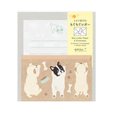 [Dog Pattern] It depicts it chasing its favorite bones and dog food. The stationery is a refreshing mint green inspired by the grasslands. The ruled lines are designed to evoke grass swaying in the wind as dogs run around.