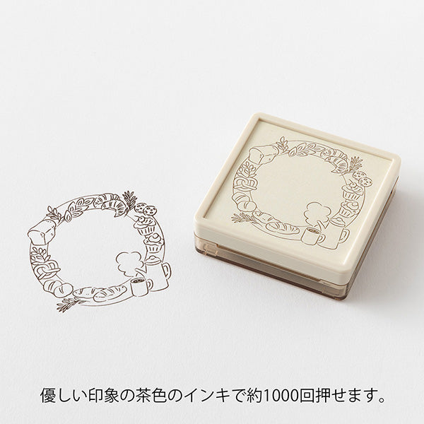 Add header and title to your notes with this cute pre-inked stamp! This is a brown ink (soft color type) that blends well with the colors and decorations of writing instruments. The stamp can be used on its own as a decoration or as a frame for titles and headers in a notebook. Pre-inked stamps are re-inkable using oil-based&nbsp;ink.

Stamp lightly for crisp impressions. Unlike the traditional rubber stamp where you need to press the stamp down and hold, pre-inked stamps work best with stamping lightly, do