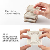 Add header and title to your notes with this cute pre-inked stamp! This is a brown ink (soft color type) that blends well with the colors and decorations of writing instruments. The stamp can be used on its own as a decoration or as a frame for titles and headers in a notebook. Pre-inked stamps are re-inkable using oil-based&nbsp;ink.

Stamp lightly for crisp impressions. Unlike the traditional rubber stamp where you need to press the stamp down and hold, pre-inked stamps work best with stamping lightly, do