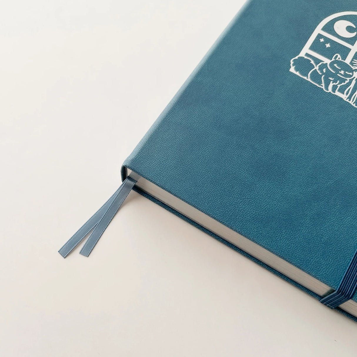 Jiji The Cat Journal in Ocean Blue with Holographic Edges and Logo 🌊✨

Product Details:

Size: A5 (5.70 x 8.26 inches)
160 Dotted Grid Pages (5 x 5 mm)
2 Bookmarks
Elastic Band and Pen Holder
Expandable storage compartment