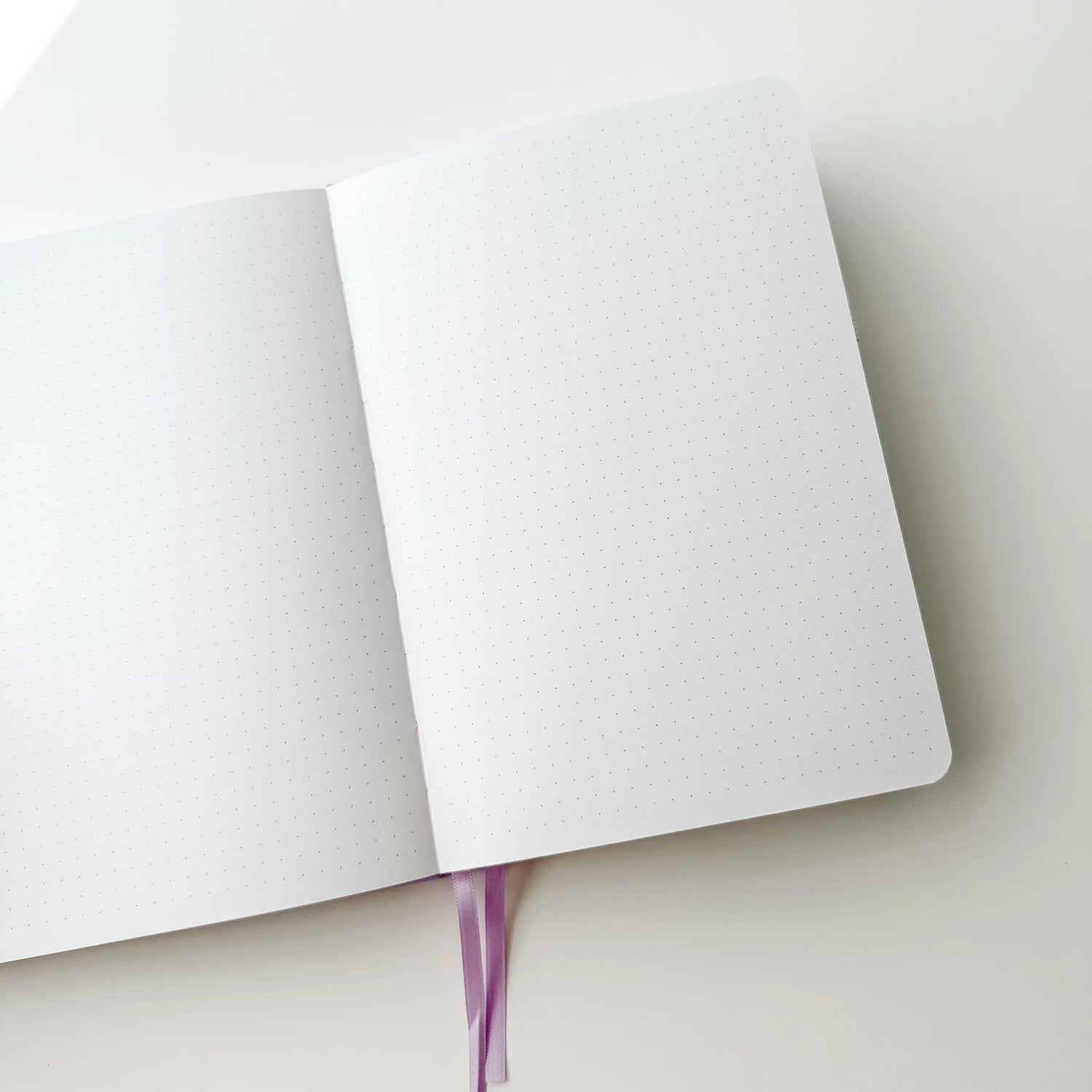 Soft pastel vegan leather bullet journal with delicate gold foil details, made to make your everyday planning feel a little more special ✨

Product Details:

Size: A5 (5.70 x 8.26 inches)
160 Dotted Grid Pages (5 x 5 mm)
2 Bookmarks
Elastic Band and Pen Holder
Expandable storage compartment