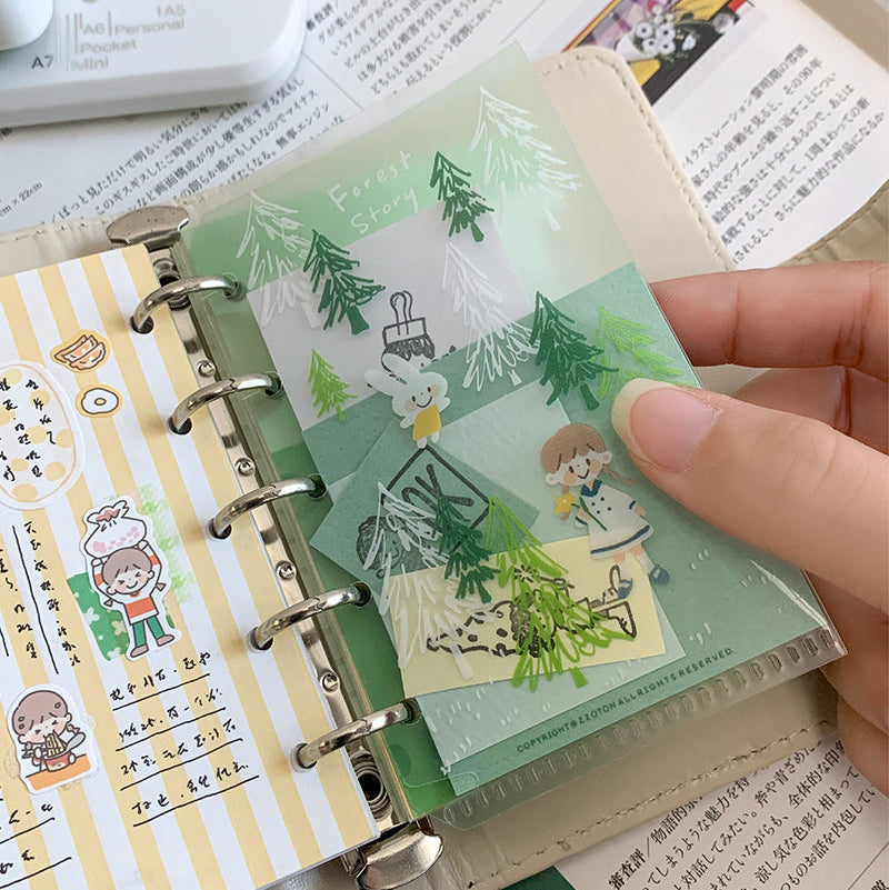 Molinta - Forest M5 Loose Leaf Storage Folder

Designed to store all your tiny treasures — from vinyl stickers to sticker flakes, memo sheets, and journaling scraps — this compact folder makes it easy to keep everything tidy and within reach.

With its lightweight build and M5-friendly size, it slips effortlessly into your planner setup or travel pouch, giving you a charming way to carry your favorite bits and pieces wherever inspiration strikes.

Specifications: 67mmx110mm
Material: Cast PP