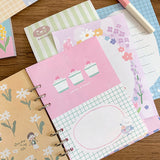 Molinta - Gentle Dreams A5 Colored Notepad

Enjoy 5 sets of 12 different designs that total to 60 sheets that can be used for various purposes such as gift wrapping or making cute collages in your journal!

Specifications: 148mmx210mm
Material: 100g white kraft paper
Full color pages inside
Number of pages: 60