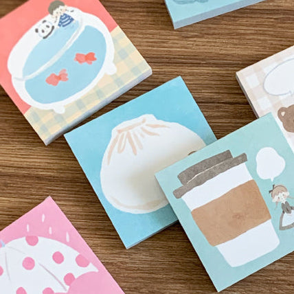Molinta - Steamed Buns Sticky Notes

Take notes or decorate your planner with this cute sticky note set! Perfect for jotting quick reminders, marking pages, or decorating your journal, this petite sticky note pad brings adorable vibes to your everyday stationery routine.

With 12 different designs to choose from, you can pick your favorites or collect the whole set.

50mm x 50mm (Approx 2in x 2in)
120g white kraft paper
50 pages

Includes 1 pattern