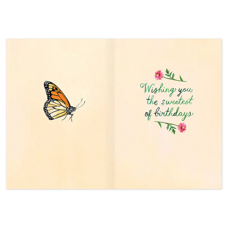 Inside verse: Wishing you the sweetest of birthdays

• Size: A6, 4.6" x 6.4"
• Illustrated by Katie Daisy
• Full-color inside
• Foil treatment
• Paired with a Brown Kraft envelope
• Printed in the USA on high-quality recycled post-consumer waste paper

About The Artist: Katie Daisy was raised by the birds and warm breezes of small-town Lindenwood, Illinois, brought up among the wildflowers with roots planted deeply in the natural world. Working in watercolor and acrylic paint, Katie strives to capture the m