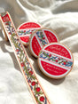 This washi tape was designed from my Chestnut Fairy Riso print! Looks like classic book art decorations with a vibrant red block separating each section.

This roll is 15mm wide x 10m of paper tape. Washi tape is super durable and flexible. It tears easily and can be safely applied to a variety of surfaces; it doesn’t leave a sticky residue behind, making it especially ideal for stationery and hanging prints temporarily.