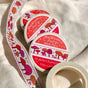 This washi tape features little mushrooms in pinks, reds, and oranges all lined up one after another. This tape design is taken from my Mushroom Fairy print's decorative borders.