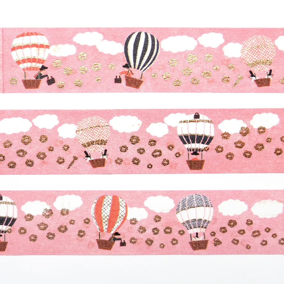 Ride a balloon with your favorite pattern and embark on a fun sky journey!
The fluffy flowers floating in the sky are also adorable. Cut short to use as stickers, or as a pop point in wrapping or decoration.


✨ Product Features

Gold foil stamping for a subtle, elegant shine
Perfect for decorating planners, journals, cards, gifts, and scrapbooks
High‑quality Cozyca Products washi tape
Size: 20 mm × 5 m