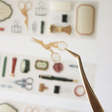 An updated version of our Stationery Essentials PET tape, now with a longer 50cm designer loop for even more creative possibilities.

This PET tape features hand-painted illustrations of vintage stationery such as wax seal stamps, fountain pens and ornate scissors. Designed by Rebecca and pre-cut for effortless use, it's perfect for journaling, collaging and adding a vintage aesthetic to any creative project.

Extra wide at 50mm with a matt transparent finish that layers cleanly over any background. No scis