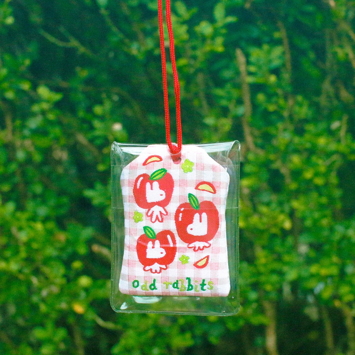 2x2.5 omamori charm with a 8 inch string.

An omamori is a Japanese charm that provides protection and luck!