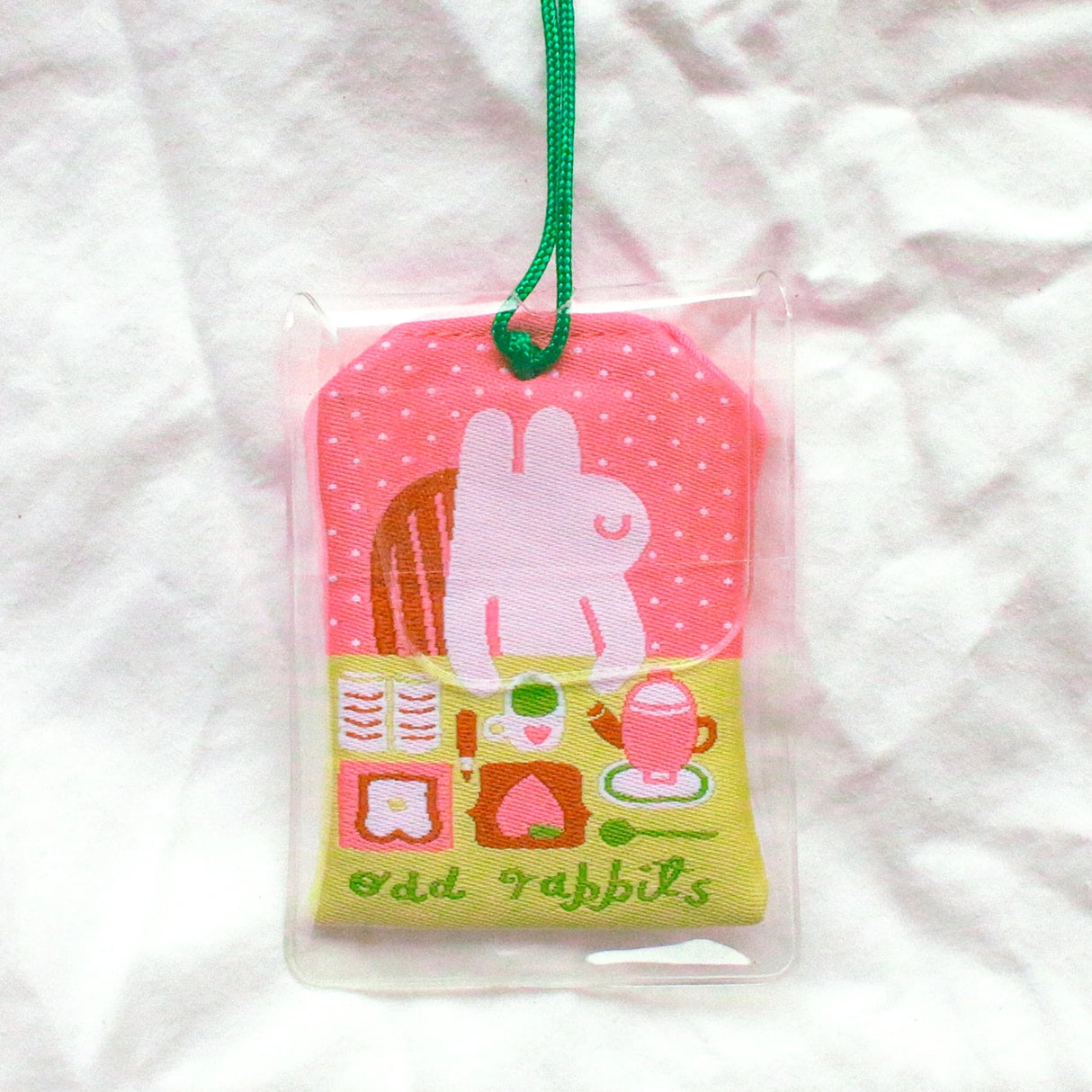 2x2.5 omamori charm with a 8 inch string.

An omamori is a Japanese charm that provides protection and luck!