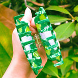 Clover Hair Claw featuring a little rabbit leaping through a field of clover.

Made of acetate, 3.5 inches long.&nbsp;
