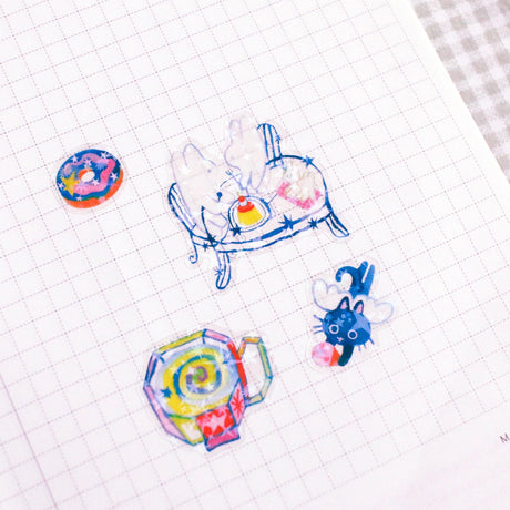 Odd Rabbits - Cosmi Cafe Star Holo Transparent Sticker Sheet

A6 Holo Transparent Sticker Sheet!

Should not be placed in areas of heavy wear (phone cases, laptops, water bottles, etc).

Great for journaling or decorating flat spaces!
