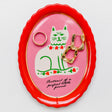 What better way to keep your cat from knocking trinkets off the table than with this adorable trinket tray? It’s got shiny gold accents but also scalloped edges to keep boop-able bobs safely in their place. Plans foiled, Whiskers. *Kisses forehead*&nbsp;