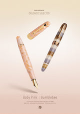 Penlux Masterpiece Delgado Baby Pink Fountain Pen

The collection of Delgado Selected is a premiere version of the Delgado which uses only rare materials and with small production quantity.&nbsp; The Baby Pink was created using PMMA resin and only 70 pieces were produced.&nbsp;

The Baby Pink Delgado has a sophisticated and dreamy look with soft blush, pastel peach, and pearlescent cream flakes suspended in a clear acrylic body. Paired with gold-plated trim and nib, it looks like a piece of polished rose qu