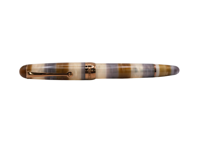 Penlux Masterpiece Delgado Bumblebee Fountain Pen

The collection of Delgado Selected is a premiere version of the Delgado which uses only rare materials and with small production quantity.&nbsp; The Bumblebee was created using PMMA resin and only 70 pieces were produced.&nbsp;

The Bumblebee Delgado features an earthy style with&nbsp;banded swirls of smoky slate grey, translucent honey amber, creamy white, and deep caramel. Topped off with copper plated trim and nib, it looks less like a bug and more like 
