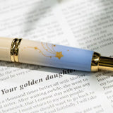 To commemorate 36 years of Kin Chi, this exclusive Pilot Capless “Starry Dawn” captures the quiet magic of the moment when night begins to surrender to morning.

Its softly layered colors move from pale blue through warm golden yellow and into a vivid morning blue, echoing the changing sky just before sunrise. Against the clouds, a radiant golden sun emerges while a scattering of stars still lingers above—an in-between moment where night and day meet.