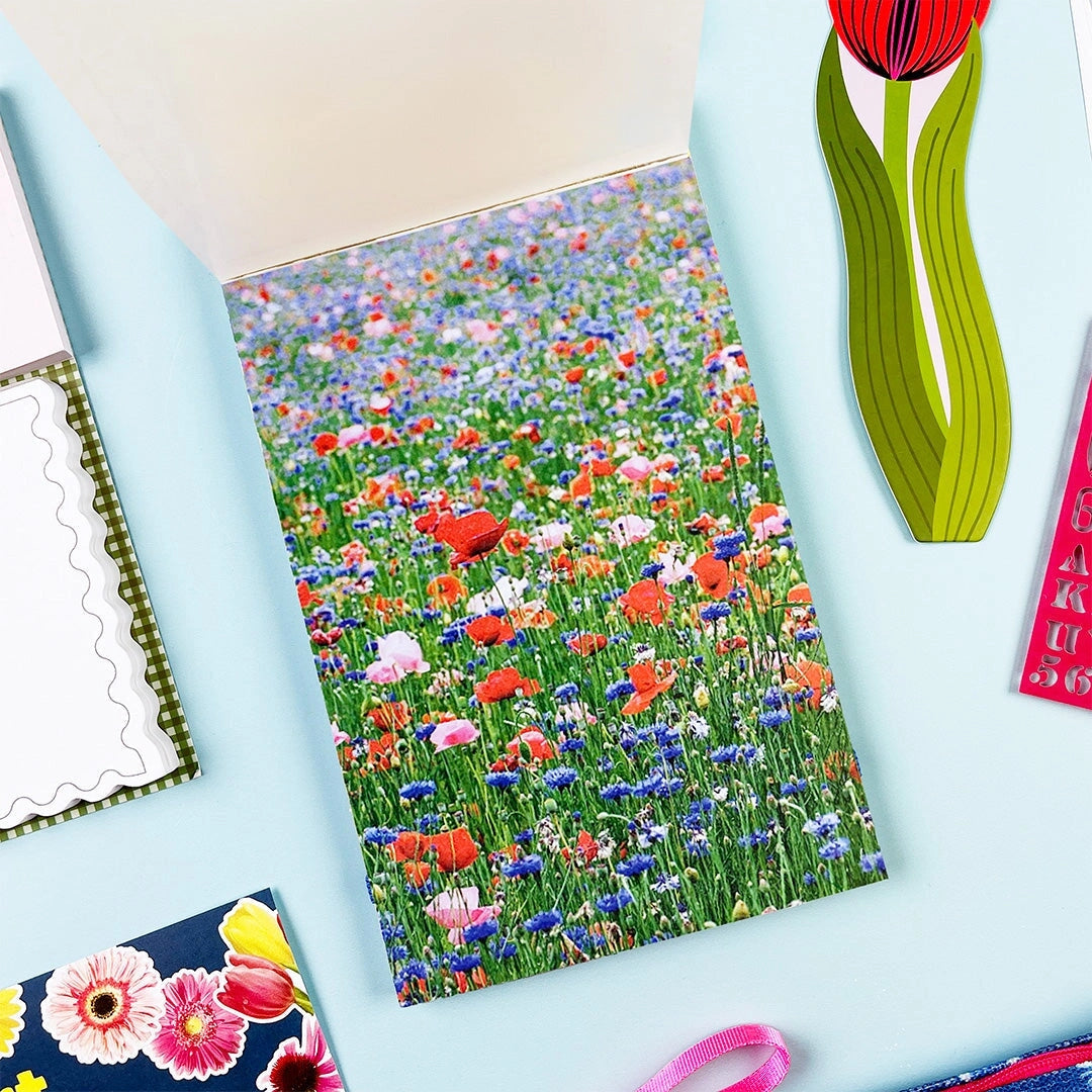 Create dreamy garden-inspired pages with the In The Garden Junk Journal Sticker Book. This creative sticker journal includes botanical stickers, patterned papers, and alphabet stickers designed for layering, collage, and junk journaling. Filled with florals, greenery, and nature-inspired textures, it’s perfect for decorating journals, scrapbooks, planners, and snail mail projects.

With 30 tear-off pages, this sticker book makes it easy to pull, place, and play—no commitment issues here. Perfect for junk jo