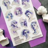 🎨💙 A study in blue, but never one-note! @artofrufi reimagines old master portrait studies with dreamy watercolor washes, striking expressions, and a palette of indigo, violet, and icy blue that gives us those moody dolce vita vibes. These faces feel like they stepped out of an art museum and straight into a technicolor daydream on the Amalfi coast! Art by: @artofrufi

Top Coating: None
Adhesive Layer: Paper
Backing Layer: Clear PET
6.69" x 3.54".
Weight - 0.03lbs
1 sheet included
