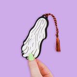 Reading Ghost' Bookmark by Turtle's Soup. Hold your spot in style with our fun and funky bookmark collection! Whether you prefer romance, fantasy, or science fiction, our bookmarks will fit perfectly between the pages of your favorite novel.

🐢 Includes orange and black tassel

🐢 Bookmark is printed on sustainably-sourced premium ultra-thick card stock with soft-touch matte texture

🐢 Unique design on the front and back

🐢 Bookmark measures 2" x 6"

🐢 Copyright © 2024 Turtle's Soup. All Rights Reserved