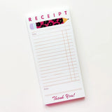 Fun long notepad with art by Karen Schipper.

4.25" x 8.75"
50 sheets
Cardboard backing.
Artwork property of Karen Schipper