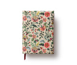 Hardbound with a removable, quilted bookcloth cover, this keepsake journal features gold-ink accents and a grosgrain ribbon to save your place.