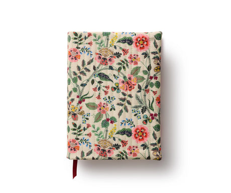 Hardbound with a removable, quilted bookcloth cover, this keepsake journal features gold-ink accents and a grosgrain ribbon to save your place.
