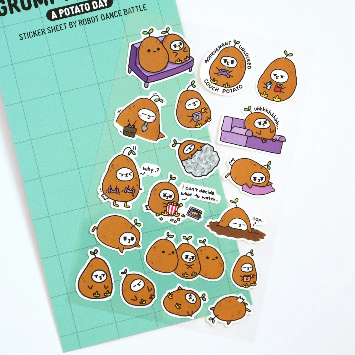 Grumpy Chicken is all about that potato life.

There are 18 individual stickers on the sheet.

They are vinyl stickers on a clear plastic sheet with a backing card.

The whole packaging is 3.8 x 8.75" and is ready to hang.
The sticker sheet is 3.75 x 5.8"
