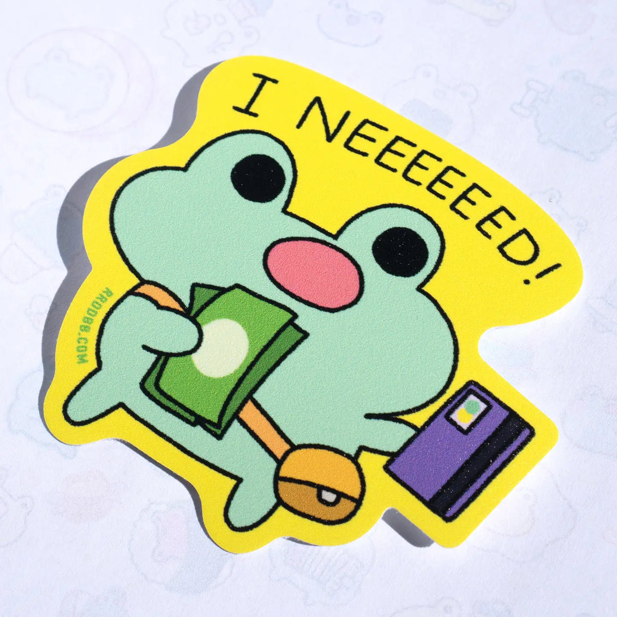 Robot Dance Battle - I Neeeeeed Shopping Frog Vinyl Sticker

Printed on premium vinyl with a UV laminate to protect it from the sun. Great for planners, bullet journals, laptop, water bottles, anywhere!

Sticker is approximately 3 x 2.6"