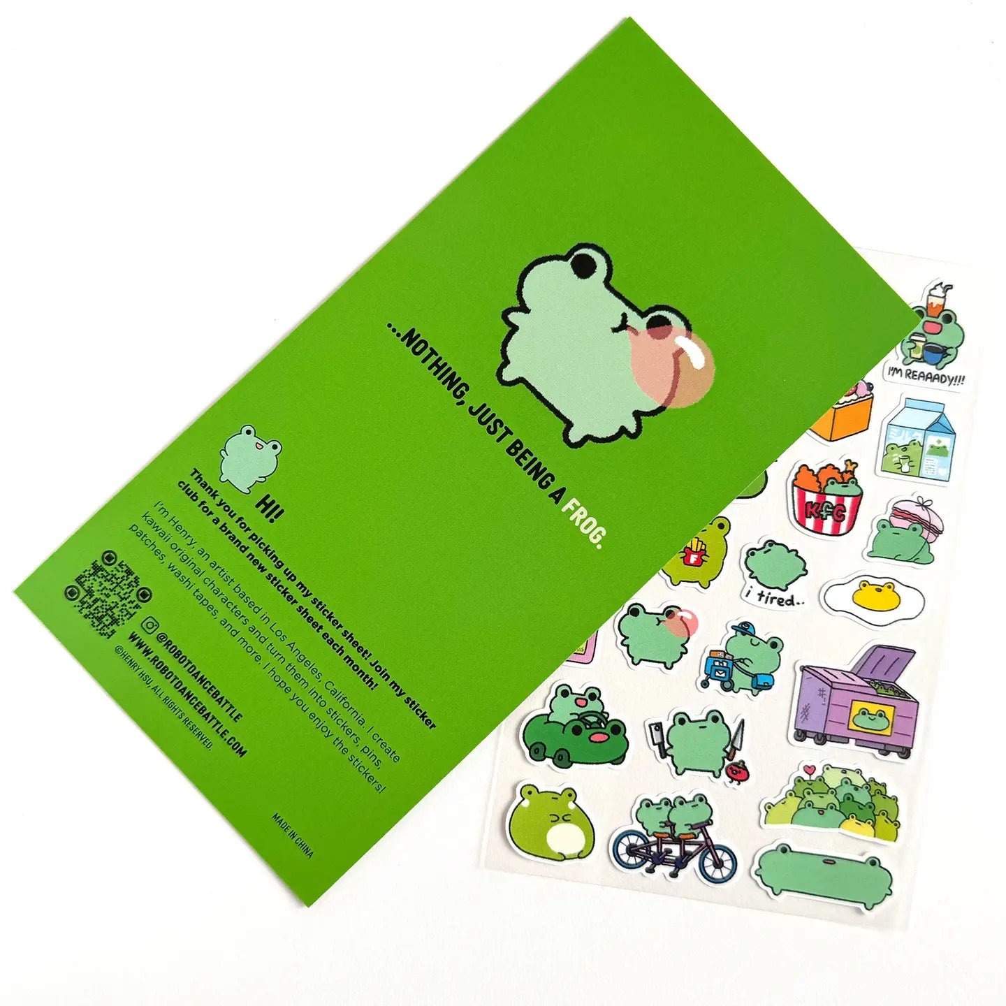 This is part of a new series of sticker sheets that feature different "days".

There are 25 individual stickers on the sheet full of FROGS.

They are vinyl stickers on a clear plastic sheet with a backing card. The bag has a hanging hole for retail display.

The whole packaging is 3.8 x 8.75" and is ready to hang.
The sticker sheet is 3.75 x 5.8"