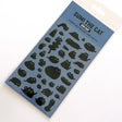 This is part of a new series of sticker sheets that feature different "days".

This one features Sumi the cat on an odd day.

There are 39 individual stickers on the sheet.

They are plastic stickers on a plastic sheet with a backing card and packaging that's ready to display.

The whole packaging is 3.8 x 8.75" and is ready to hang.
The sticker sheet is 3.75 x 5.8"