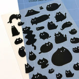 This is part of a new series of sticker sheets that feature different "days".

This one features Sumi the cat on an odd day.

There are 39 individual stickers on the sheet.

They are plastic stickers on a plastic sheet with a backing card and packaging that's ready to display.

The whole packaging is 3.8 x 8.75" and is ready to hang.
The sticker sheet is 3.75 x 5.8"